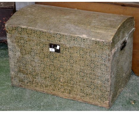 A Victorian paper covered pine dome top trunk, circa 1880.