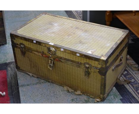 A Vintage brass framed travelling trunk, 