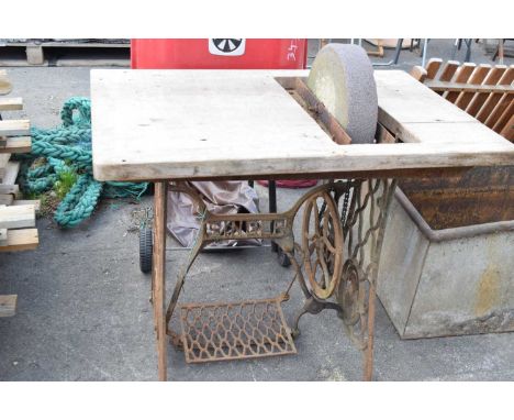Vintage Singer sewing machine base with grinding stone