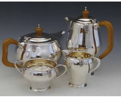 Silver four-piece tea service, Elkington, Birmingham 1960, each applied with rim lappets, composition handles, gross weight 4