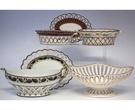 Four creamware baskets, two with stands, one impressed Turner, another Sewell,  painted with floral borders, early 19th centu