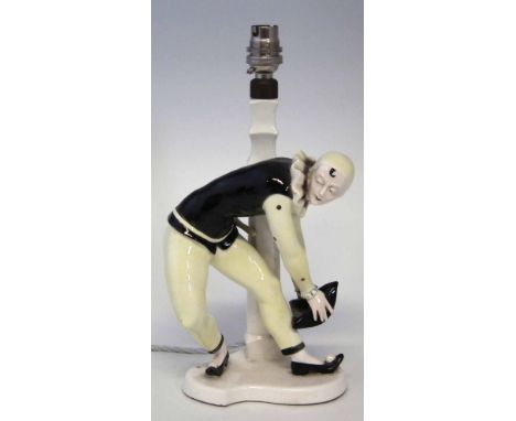 Sitzendorf lamp base, modelled with Pierot wearing yellow and black costume, printed mark to base, 31cm overall height.      