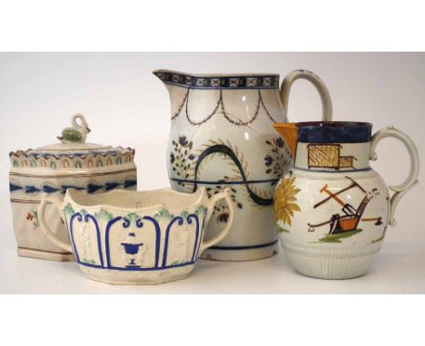 Four pieces of Prattware, to include two jugs, one painted with agricultural tools and a bail of hay, the second painted with