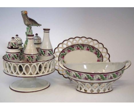 Sewell pearlware cruet set and matching basket and stand circa 1820,   with central perched bird finial, fitted with two bott