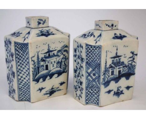 Two pearlware tea caddies circa 1780   painted in underglaze blue with pagodas, with unusual blue branches painted to the bas