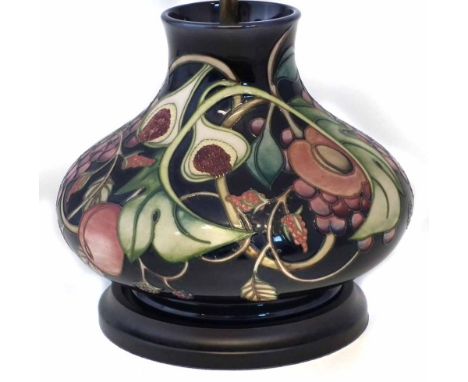 Moorcroft lamp, decorated with Queen's Choice pattern after Emma Bossons, blue felt capped wood base, with Moorcroft shade, t