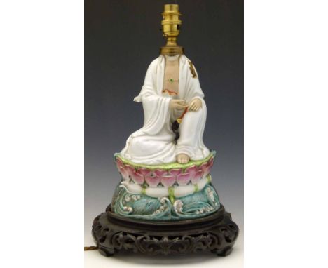 Table lamp made from a headless Chinese figure, height 32cm.
Condition report: head broken off and missing; most of the lotus