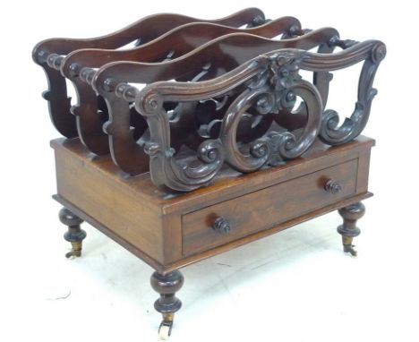 A Victorian rosewood and mahogany Canterbury, the three division top with pierced decoration and turned end supports, single 