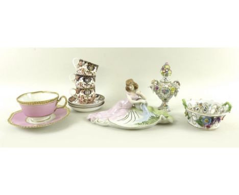 A Flight Barr and Barr cabinet cup and saucer, circa 1830, decorated with gilded and moulded rims and a pink ground, three De