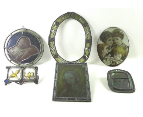 A group of Victorian stained glass panels in the Pre-Raphaelite style, attributed to glass painter and artist A E Roe, compri