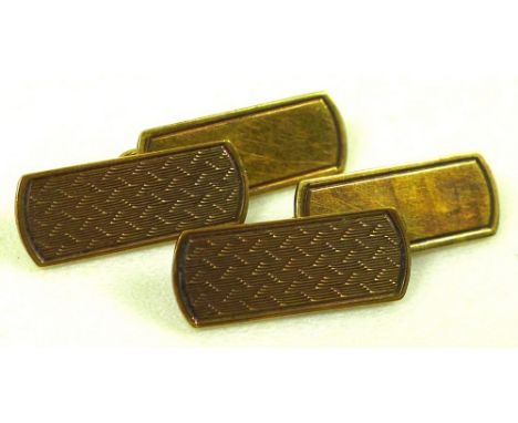 A pair of 9ct gold cufflinks, of rectangular form with engine turned decoration, 6.6g.