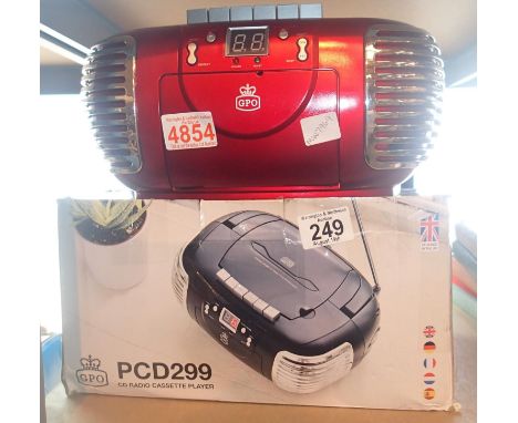 Red GPO PCD299 A 3-in-1 FM/AM Radio, CD and Cassette player. P&amp;P Group 3 (£25+VAT for the first lot and £5+VAT for subseq