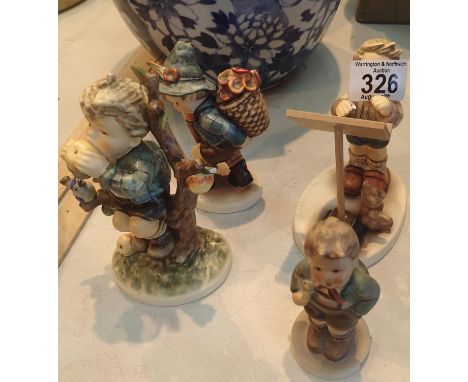 Four ceramic Goebel figurines. Condition report: conductors baton is missing other three are fine. This lot is not available 