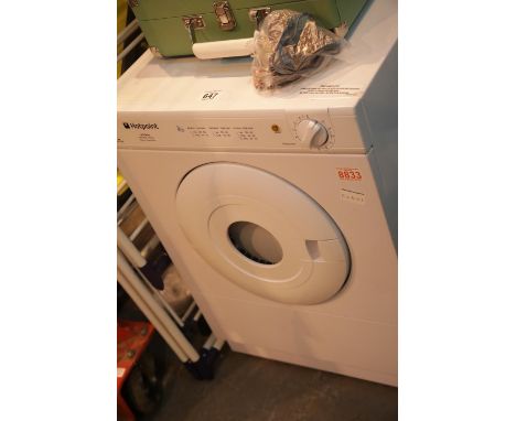 Hotpoint tumble dryer and an airer. This lot is not available for in-house P&P.Condition Report: All electrical items in this