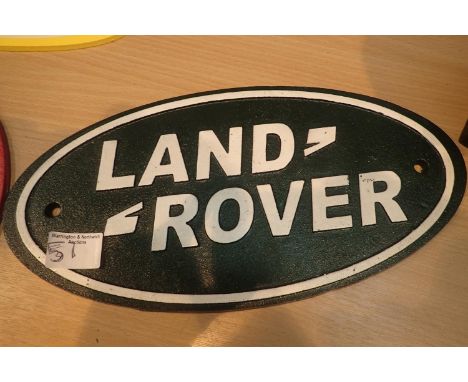 Cast iron Land Rover sign, L: 35 cm. P&amp;P Group 2 (£18+VAT for the first lot and £3+VAT for subsequent lots) 