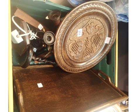 Collection of wooden items to include tray carved platter, four barley twist candlesticks, table lamp base and two crucifixes