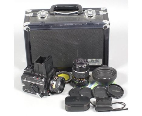 Mamiya 645 1000s camera with 80mm f2.8 & 150mm f3.5 Lenses. (condition 5F). Also caps & hood and a Weston light meter (condit