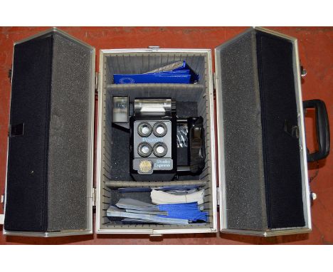 Polaroid Studio Express Portrait Outfit. Including 3 different format print cutters. All in large metal case.W