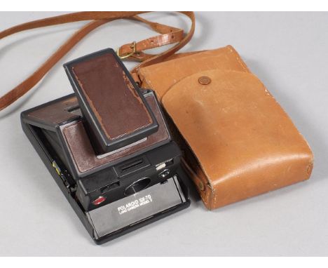 Polaroid SX-70 Folding SLR Land Camera. (condition 6F). Sold "As Seen" but appears working (used film pack with battery avail