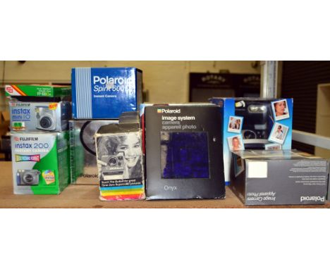 Collection of Polaroid Instant Print Cameras, in Original Boxes. To include Onyx Image System, Sprint 600CL 600 Fun Kit etc. 