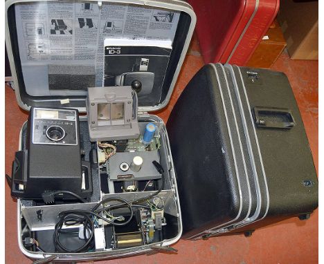 2 LARGE Polaroid ID-3 Camera Outfits. In heavy-duty suitcases, plus a mount cutter. Please Note: VERY heavy, for collection o