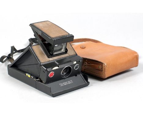 ANNOUNCE: Only one camera in this lot. Polaroid SX-70 Folding SLR Camera. (condition 6F). Sold "As Seen" but appears to be wo