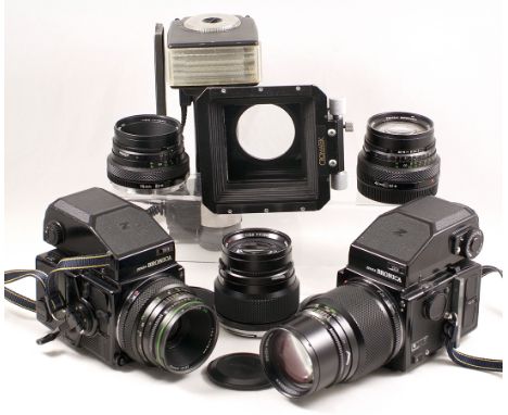 Extensive Bronica Medium Format Outfit. Comprising Bronica ETRS body with Zenzanon EII 75mm f2.8 lens & AEII prism (condition