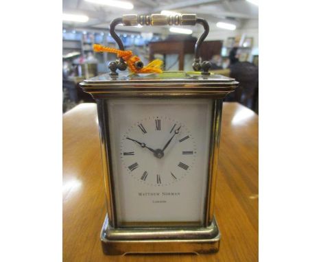 A Matthew Norman five window carriage clock with key 