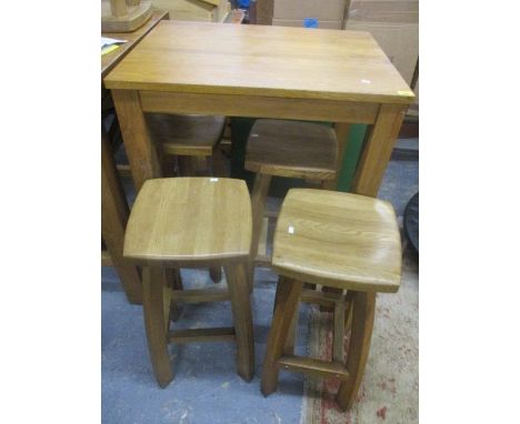 A modern light oak table 40"h x 31 1/2"w and four stools 