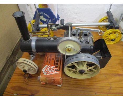 A Mamod live steam traction engine and log trailer 