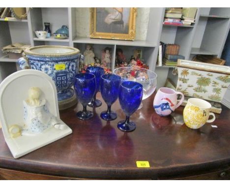 A mixed lot to include a Carlton ware bookend and an oriental style porcelain blue and white jardiniere with gilt metal mount