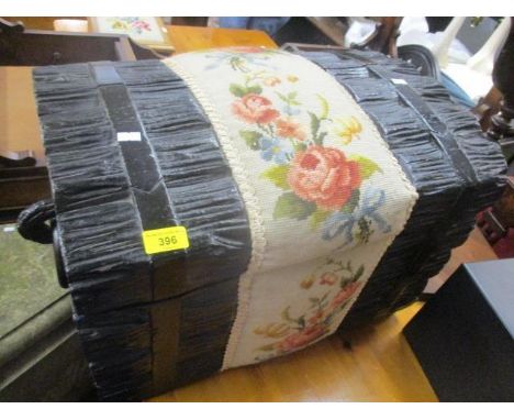 A painted and tapestry covered trunk with twin carrying handles 16"h x 24"w 