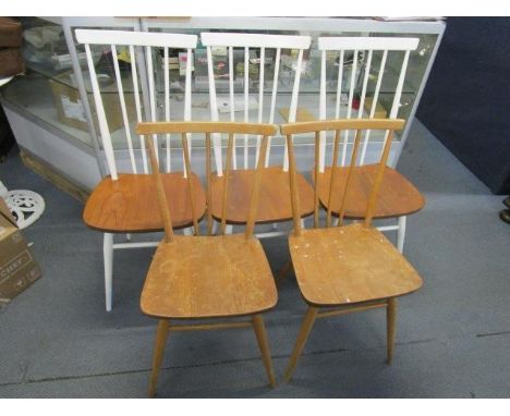 Three 1960s retro Ercol white painted bar back chairs, tamped British standard mark underneath reading BS 1960 LL 2056, along