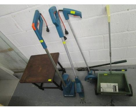 Various garden tools to include a Black and Decker power weeder and other items, and an oak barley twist table 