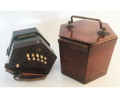 A Lachenal &amp; Co. London 16666 21 button concertina in mahogany fitted case. IMPORTANT: Online viewing and bidding only. C
