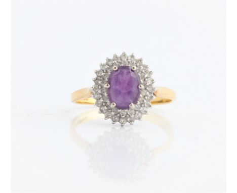 A hallmarked 18ct yellow gold amethyst and diamond ring, ring size O½, approx. weight 3.5g. IMPORTANT: Online viewing and bid