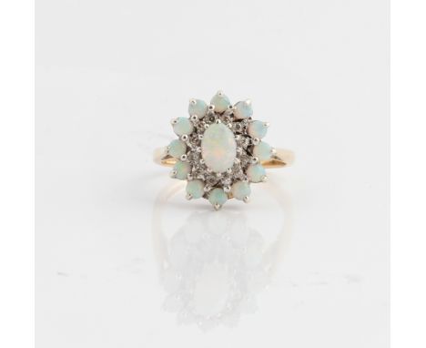 A hallmarked 9ct yellow gold opal and diamond cluster ring, ring size N, approx. weight 3.7g. IMPORTANT: Online viewing and b