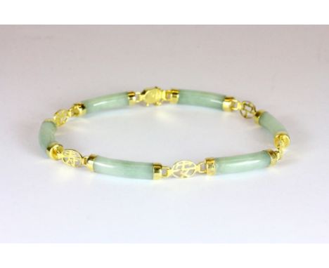 A 14ct yellow gold and jade bracelet