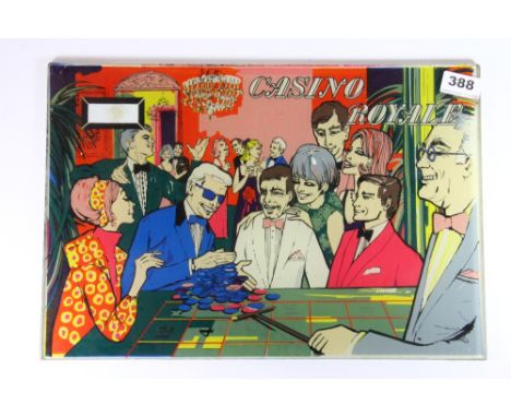 A 1970s glass gaming machine panel (42 x 28cm)