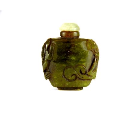 A Chinese carved green jade snuff bottle mounted with 2 young dragons, H 6cm