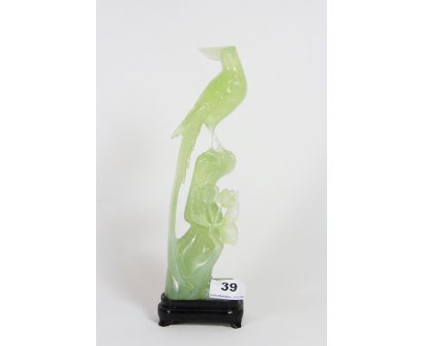 A 1950s / 1960s Chinese carved jade bird figure with original box. H. 28cm.