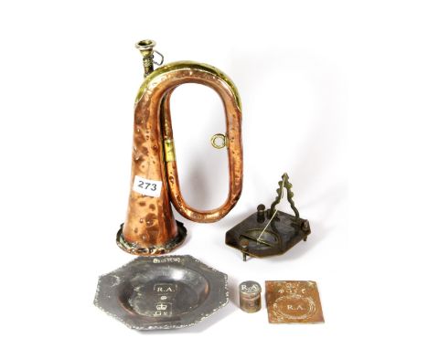 A George V Army Training Regiment, Purbright copper and lead panel, lead dish, die stamp and bugle and a brass compass