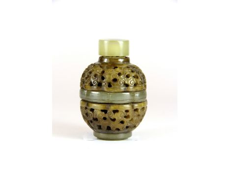 A Chinese carved jade snuff bottle with rotating decoration, H 7cm