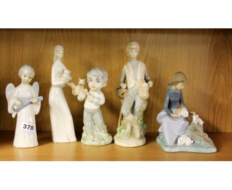 A Nao figure of a girl and 4 similar figures