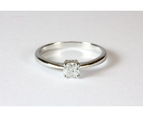 A 9ct white gold diamond solitaire ring (K)