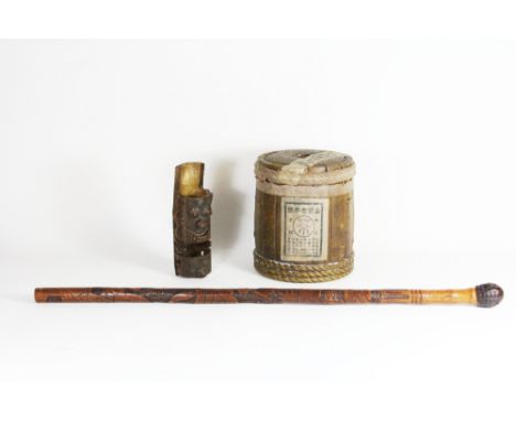 An early 20th century Chinese carved bamboo walking stick, a carved bamboo model sampan together with a terracotta storage ja