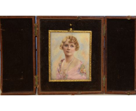 English School (early 20th century), Head and shoulders portrait of a lady, portrait miniature, 9 x 7cm in folding morocco ca