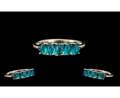 Neon Apatite Five Stone Band Ring, five oval cut cabochons of the rarest form of apatite, the vivid neon apatite, totalling 1