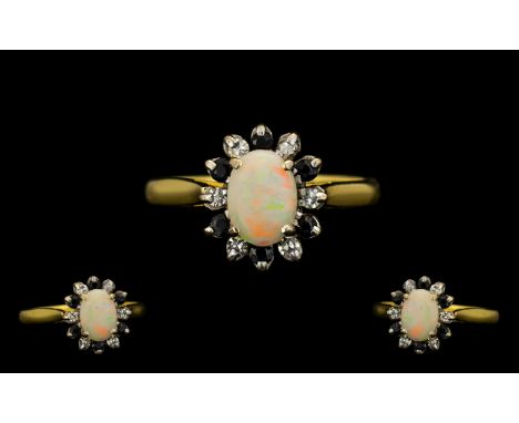 18ct Gold - Attractive Opal / Diamond / Sapphire Set Dress Ring. Marked 18ct Gold, The Central Opal Surrounded by Diamond and