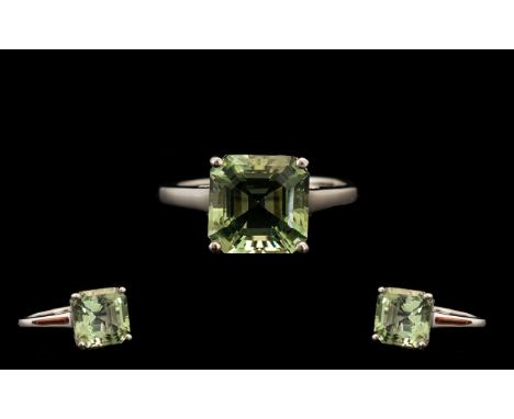 Green Amethyst Asscher Cut Solitaire Ring, a 10mm square green amethyst, here in the sparkling Asscher cut, measuring 4.75cts